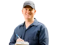 Hvac technician writing on pad with pen smiling